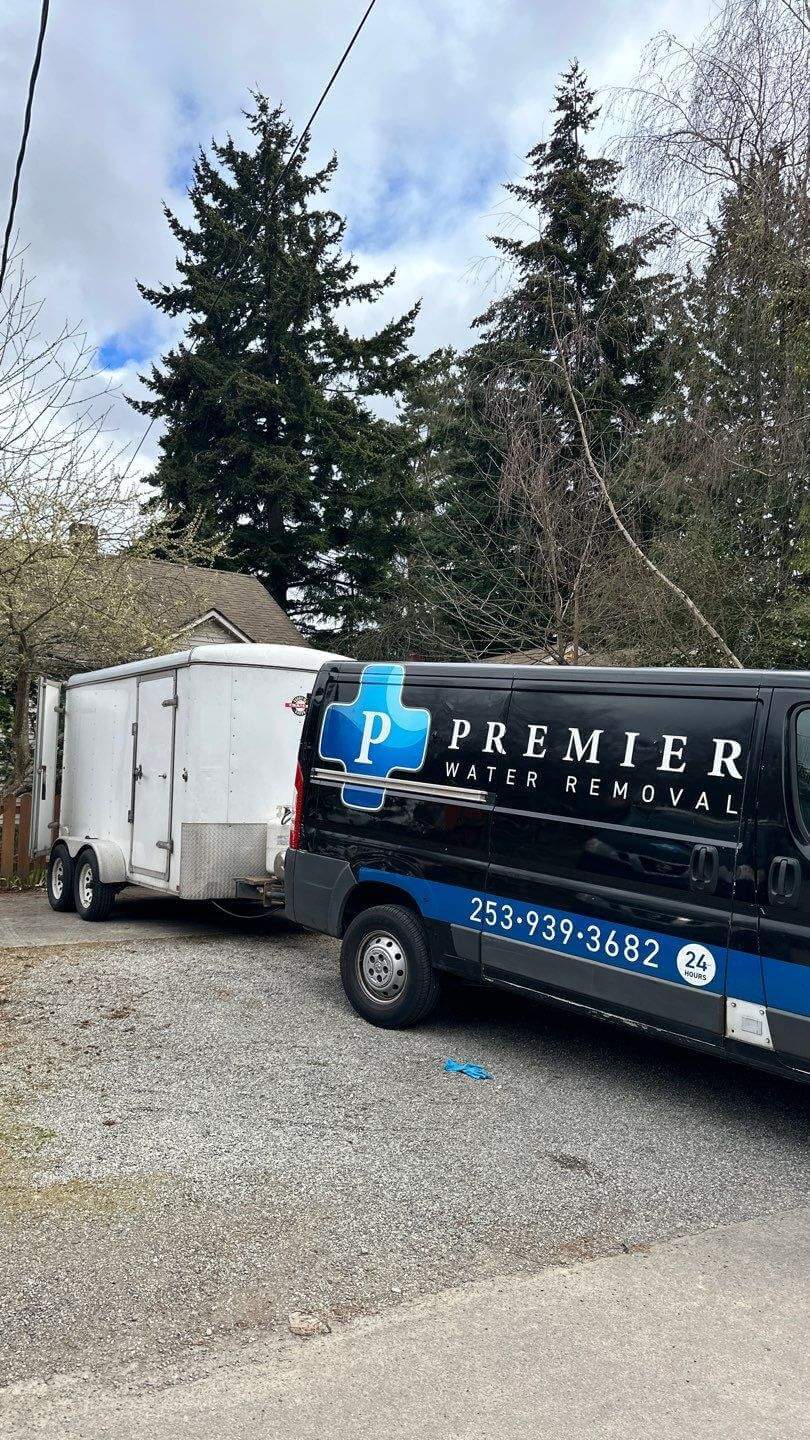 Premier Water Removal van with trailer attached