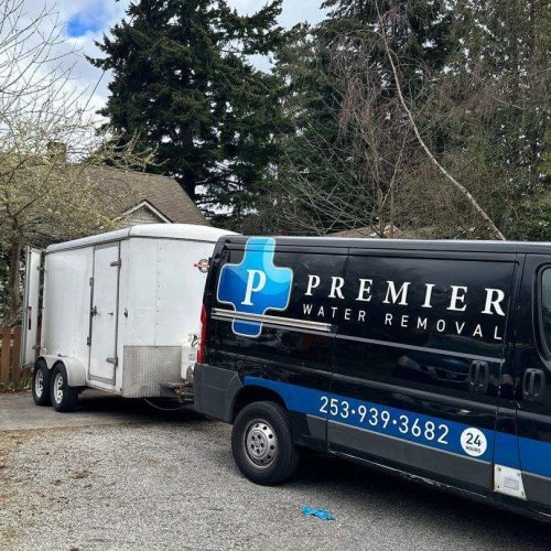 Premier Water Removal van with trailer attached